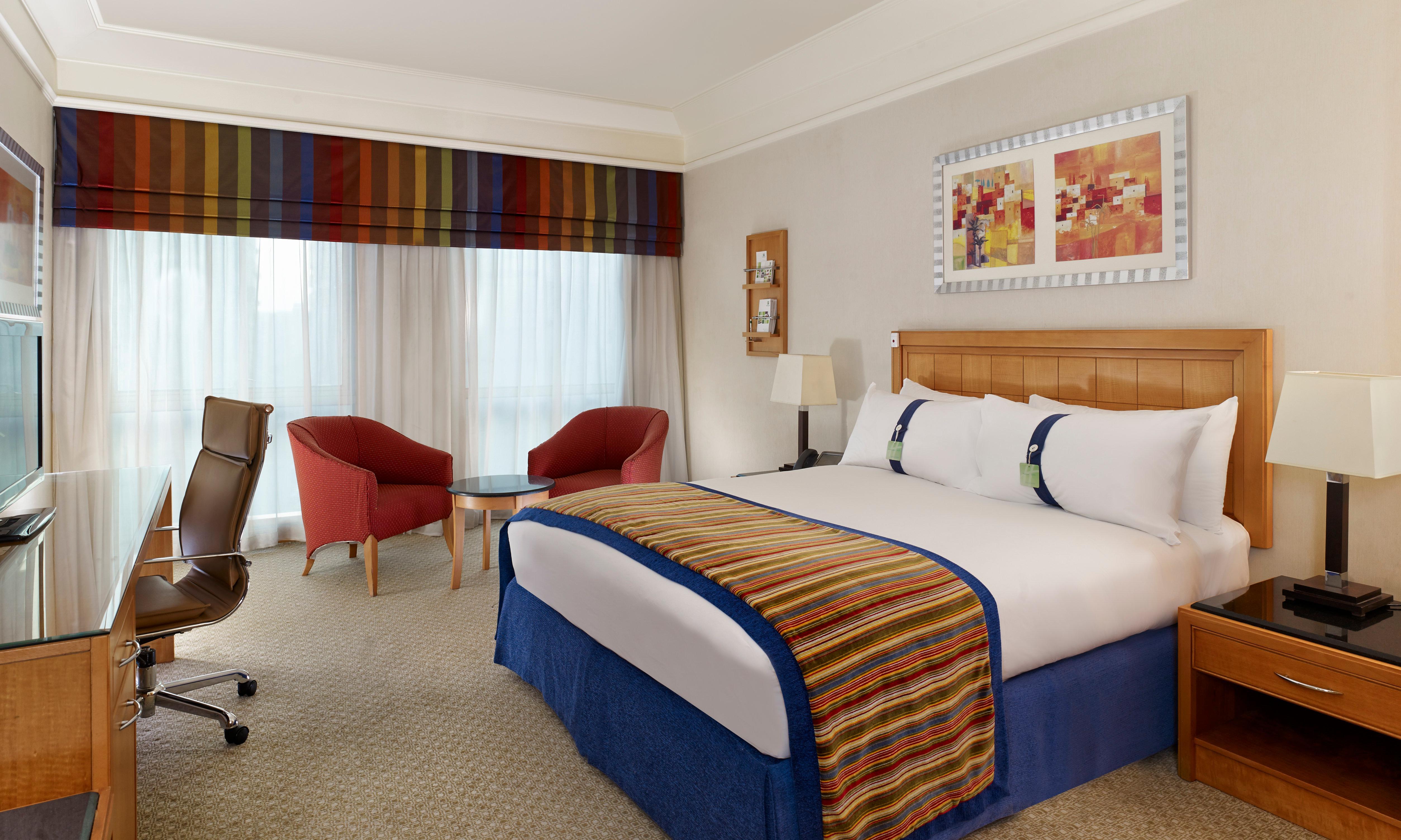 Holiday Inn Citystars By Ihg Le Caire Extérieur photo A typical room at the Holiday Inn London - Kensington
